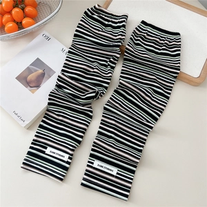 Detailed view of the striped ribbed knit texture and soft fabric of the cooling arm sleeves