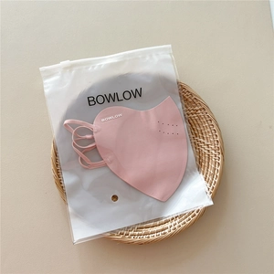 Pink breathable sun protection mask with brand print in a frosted zipper storage bag