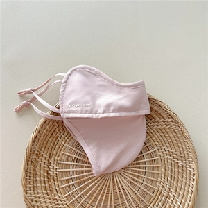 Detail of pink sun protection face mask with breathable mesh and adjustable ear loops