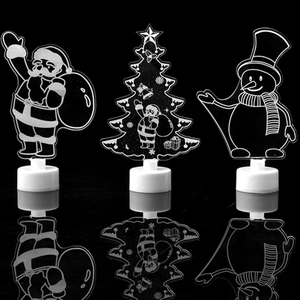 Three LED Christmas acrylic lamps with Santa Claus, Xmas tree, and snowman designs