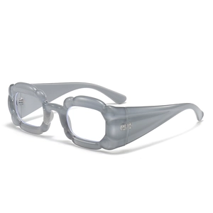 Chunky grey wavy frame sunglasses with y2k aesthetic and unique pumpkin curve design