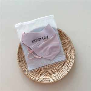 Detail of lotus pink sun mask in premium frosted zip bag packaging by BOWLOW