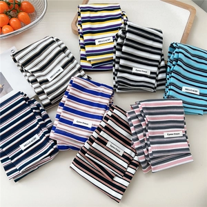 Striped cooling arm sleeves in multiple colors for sun protection during outdoor cycling