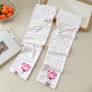 Close-up of cute cartoon girl print and yellow checkered cooling sun protection sleeves