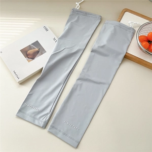 Detail of light grey ice silk arm sleeves with adjustable drawstring and letter print