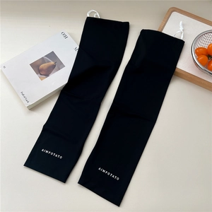 Detail of black sun protection sleeves with adjustable white drawstring and brand logo