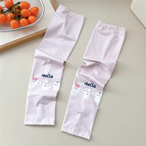 Detail of pink ice silk sun sleeves featuring cute dog prints and drawstring cuffs