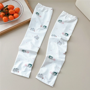 Detail of white sun protection sleeves featuring cute elephant prints and knit texture