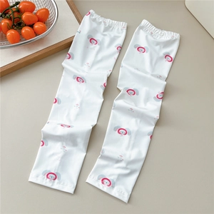 Close-up of cooling ice silk sun sleeves with cute cartoon rabbit print and elastic cuffs