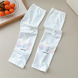 Close-up of white sun protection arm sleeves with cute bear cartoon and drawstring detail