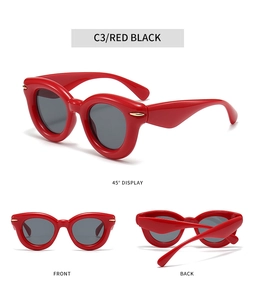 Three-way view of red oversized bubble sunglasses with black lenses and gold accents