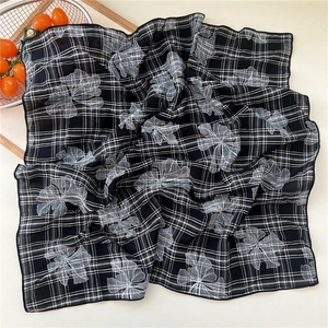 Floral cotton linen scarf with black and white checkerboard pattern and smooth stitched edges