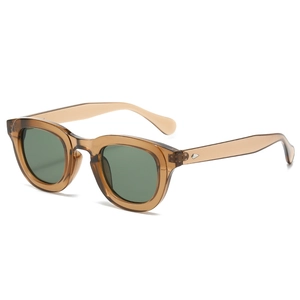 Retro oval sunglasses with brown translucent frames and dark green lenses in side view