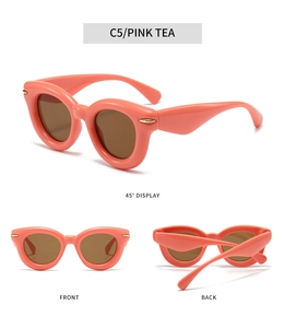 Front, back and side views of pink tea cat eye sunglasses with gold rivet accents