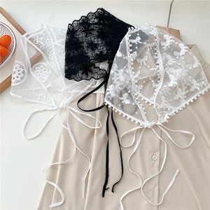 Pastel lace triangle headscarf and waist belt with floral crochet patterns in black and white