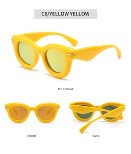 Detailed views of yellow bubble sunglasses with thick frames and metallic spindle accents