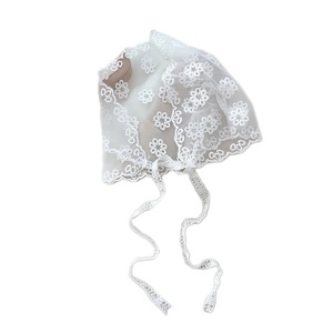 White floral lace baby bonnet with breathable mesh embroidery and delicate ribbon ties