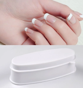 Detail of white French manicure dip powder tray showing model results and tool structure