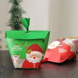 Christmas paper gift boxes with Santa and reindeer illustrations and ribbon handles
