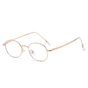 Minimalist oval metal blue light blocking glasses in rose gold finish for daily wear