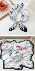 Silk scarf with Dalmatian print, polka dots, and Happy Everyday text detail
