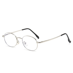 Minimalist silver metal oval eyeglasses frame with slim temples and anti-blue light lenses