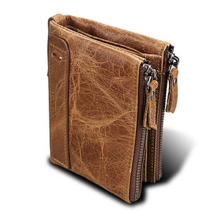 Detail view of brown crazy horse leather wallet with secure double zipper closure