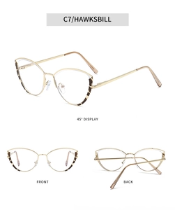 Three-angle view of gold cat-eye metal glasses frames with hawksbill pattern accents