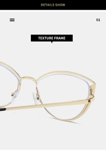 Detail of golden metal cat eye glasses frame with textured finish and clear lenses