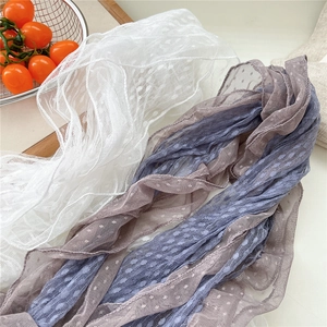 Lightweight sheer lace triangle scarf with polka dot mesh pattern in white and lavender