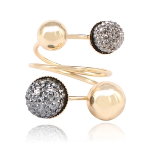 Detail of spiral brass ring with smooth gold spheres and silver pavé crystals