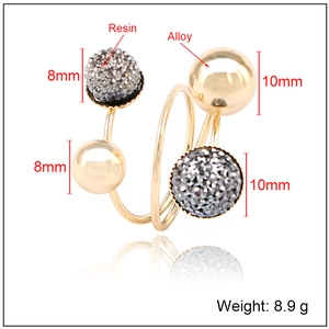 Detailed size and weight specs for a multi-layer spiral ring with resin and alloy beads