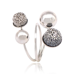 Detail of silver multi-layer ring featuring polished beads and sparkling micro-pave crystals