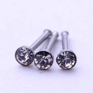 Set of three 1.8mm stainless steel nose studs featuring round clear zircon stones