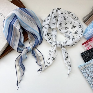 Elegant lightweight floral neck scarf for women featuring diverse prints on a white background