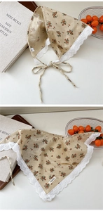 Close-up of floral cotton linen bandana with white lace trim and intricate patterns