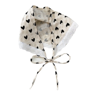 Cream lace triangle scarf with black heart print and decorative heart lace edges