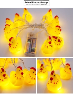 Detail of yellow chicken LED string lights showing battery box and warm glow features