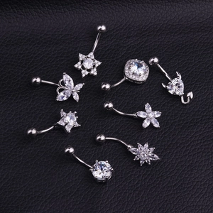 Collection of stainless steel belly rings with zircon stars and butterfly designs