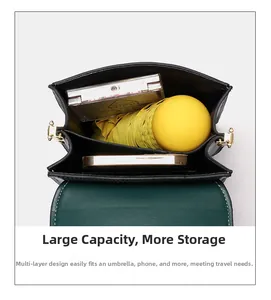 Crossbody bag interior detail showing spacious multi-layer accordion storage structure