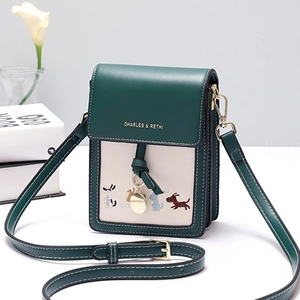 Green and cream crossbody phone bag with cute dog embroidery and adjustable strap