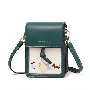 Mini shoulder phone bag with puppy embroidery and adjustable strap on white background