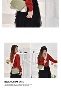 Close-up of stylish square crossbody bag featuring green flap and embroidered wide strap