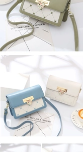 Détail du sac bandoulière avec fermoir cœur floral et motif de cœur surpiqué