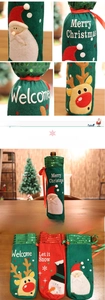 Close-up of festive Christmas wine bottle covers with felt textures and sequins