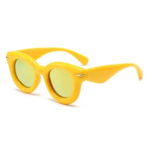 Chunky retro round sunglasses in bright yellow finish with thick bubble frames and tinted lenses
