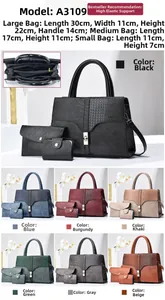 Detailed macro view of 3-piece bag set with crocodile embossed texture and dimensions