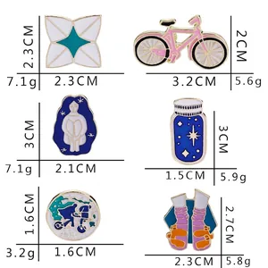 Set di spille smaltate creative con bicicletta, silhouette di ragazza e bottiglia dei desideri