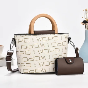 Elegant two-piece white tote bag set with WOPO logo print and brown handles
