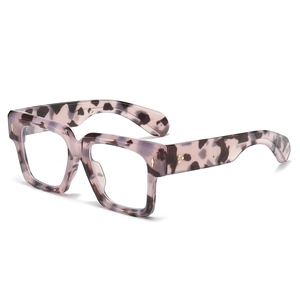 Oversized square tortoiseshell glasses frame with purple accents and gold arrow rivets